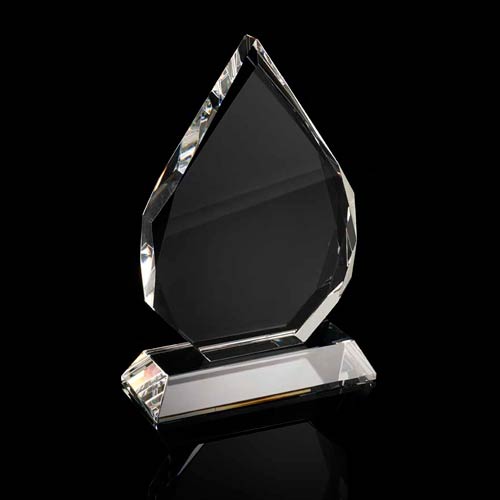 Crystal facetted diamond shaped award on crystal base supplied in a presentation box