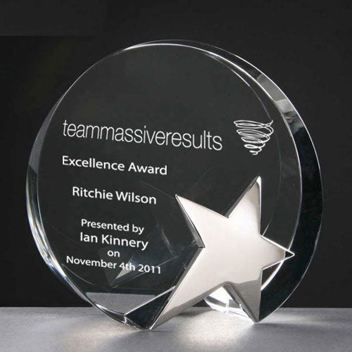 Round crystal award with chrome star 120mm high supplied in a presentation box
